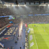 Fireworks shoot off behind the goal to celebrate a Paris Saint-Germain victory at the Parc des Princes stadium