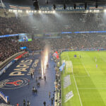 Fireworks shoot off behind the goal to celebrate a Paris Saint-Germain victory at the Parc des Princes stadium