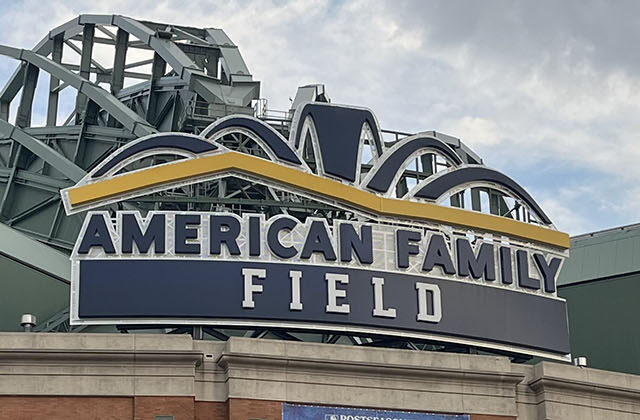 Signage above the home plate gate at American Family Field in Milwaukee, Wisconsin