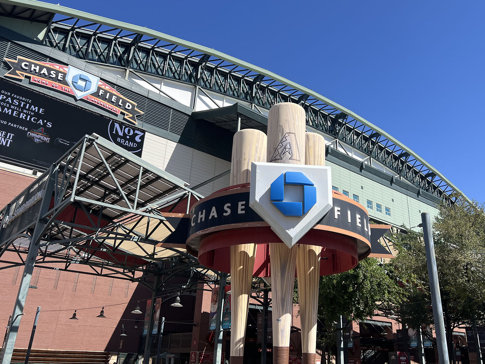 Signage adorns the plaza and façade in front of Chase Field in Phoenix, Arizona