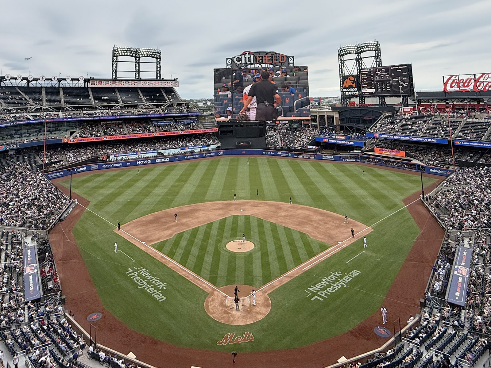 View of the field from the upper deck behind home plate at Citi Field in Flushing, New York, during a Mets baseball game