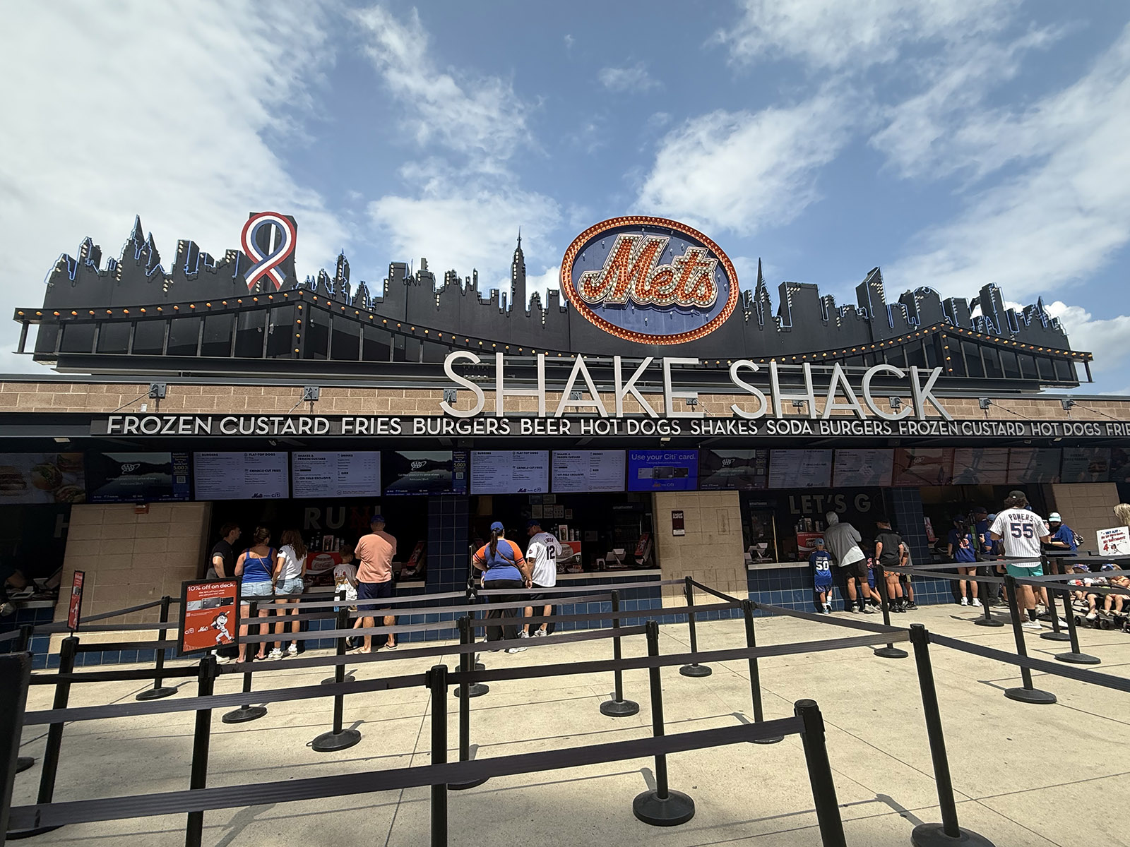 A silhouetted depiction of the New York City skyline stands atop the Shake Shack stand in the outfield at Citi Field in Flushing, New York