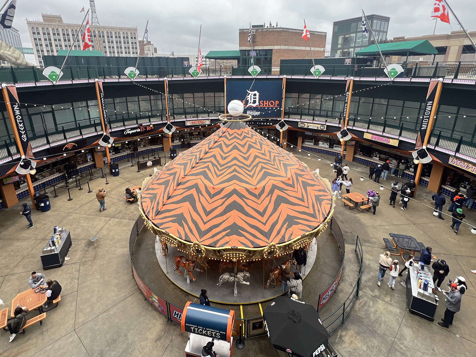 The Big Cat Court at Comerica Park in Detroit, Michigan, includes concession stands and a carousel