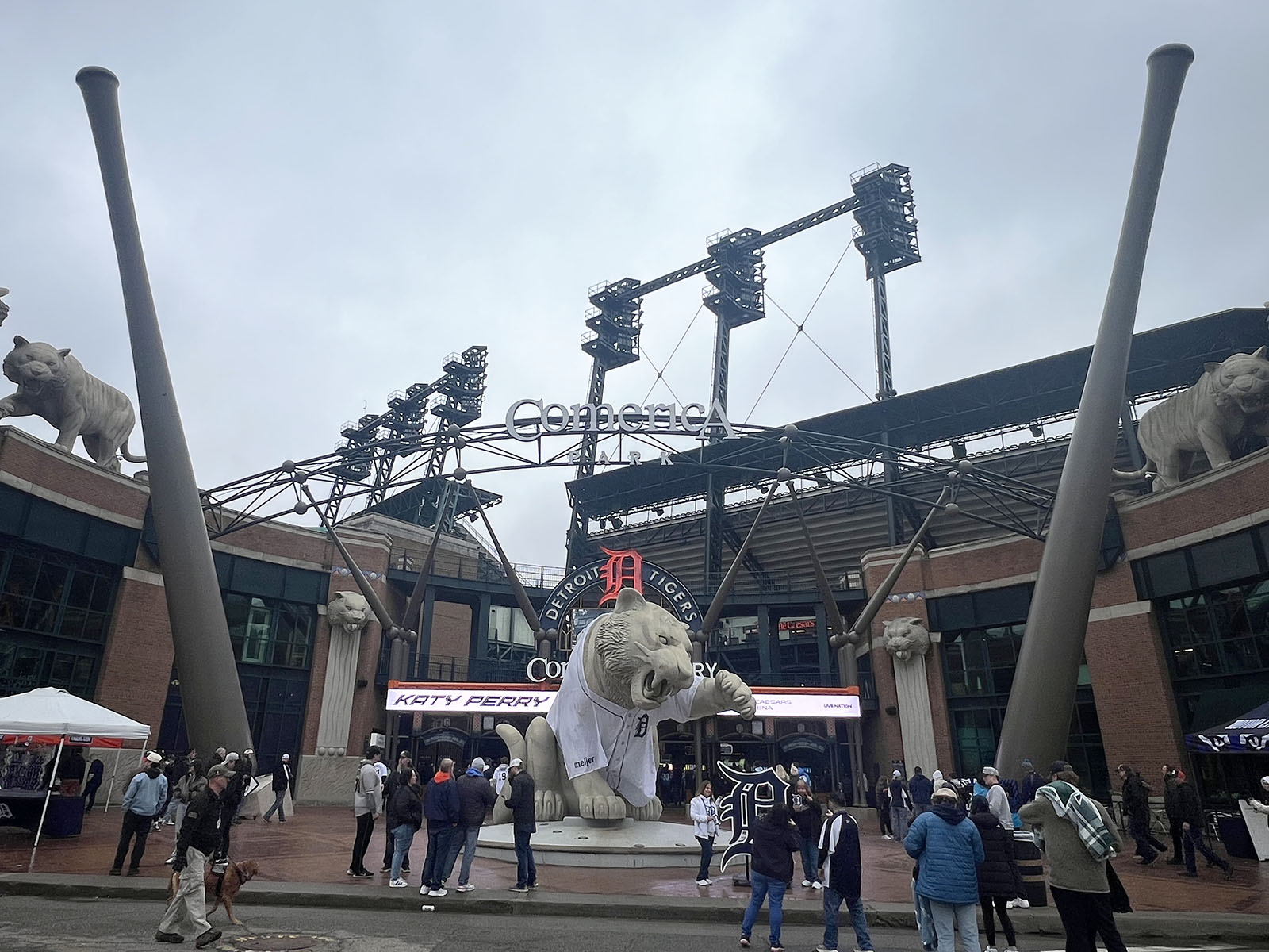A large tiger statue stands in front of the third base gate at Comerica Park in Detroit, Michigan