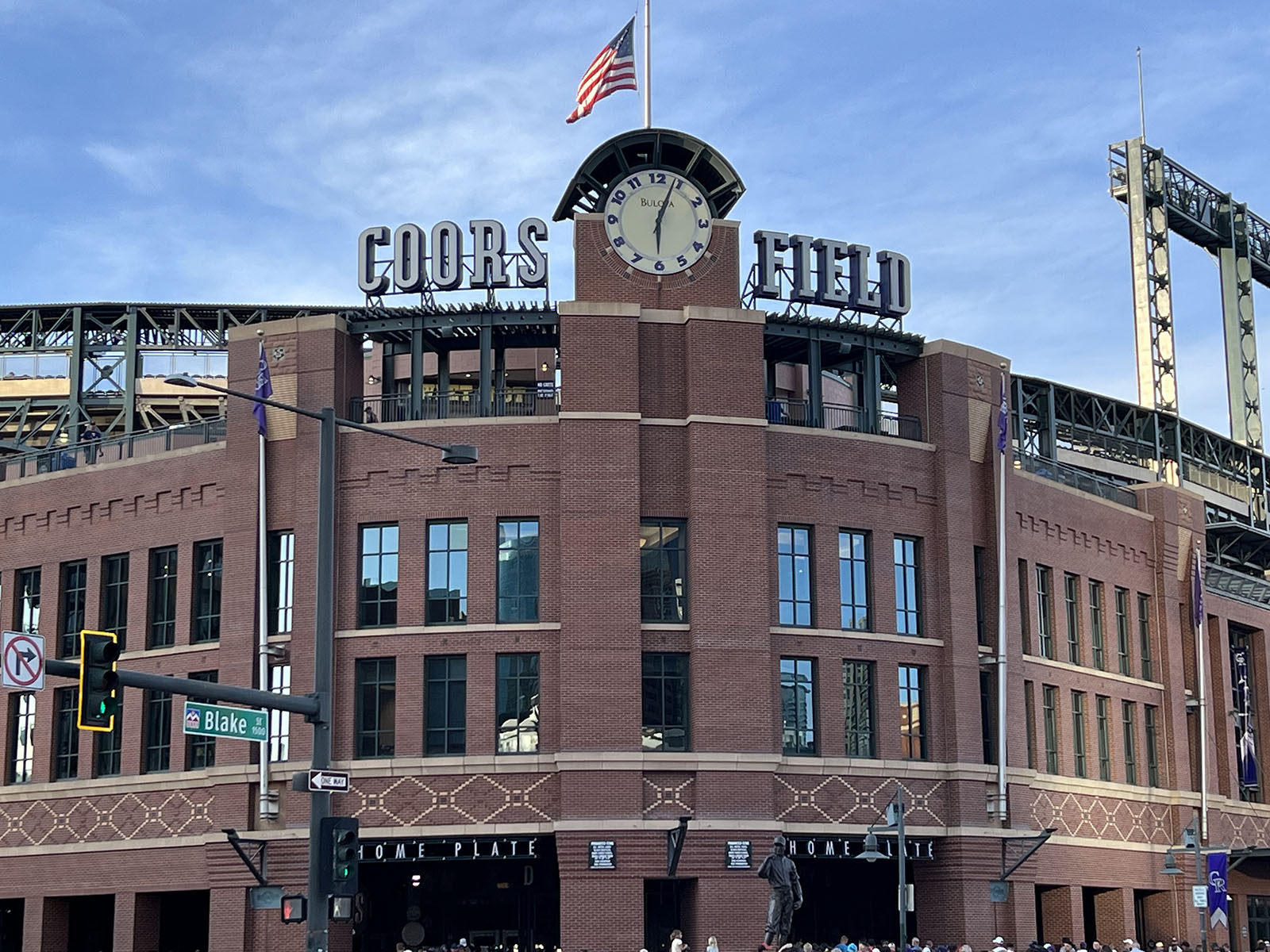 Signage atop the home plate gate at Coors Field in Denver, Colorado