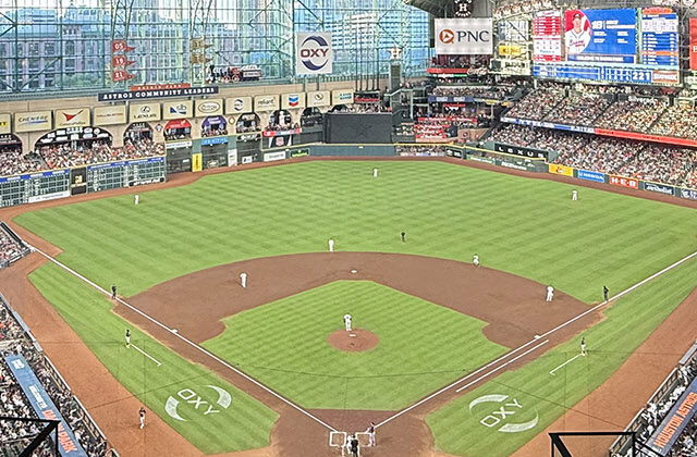 Panoramic view of the seating bowl at Daikin Park in Houston, Texas, during an Astros baseball game