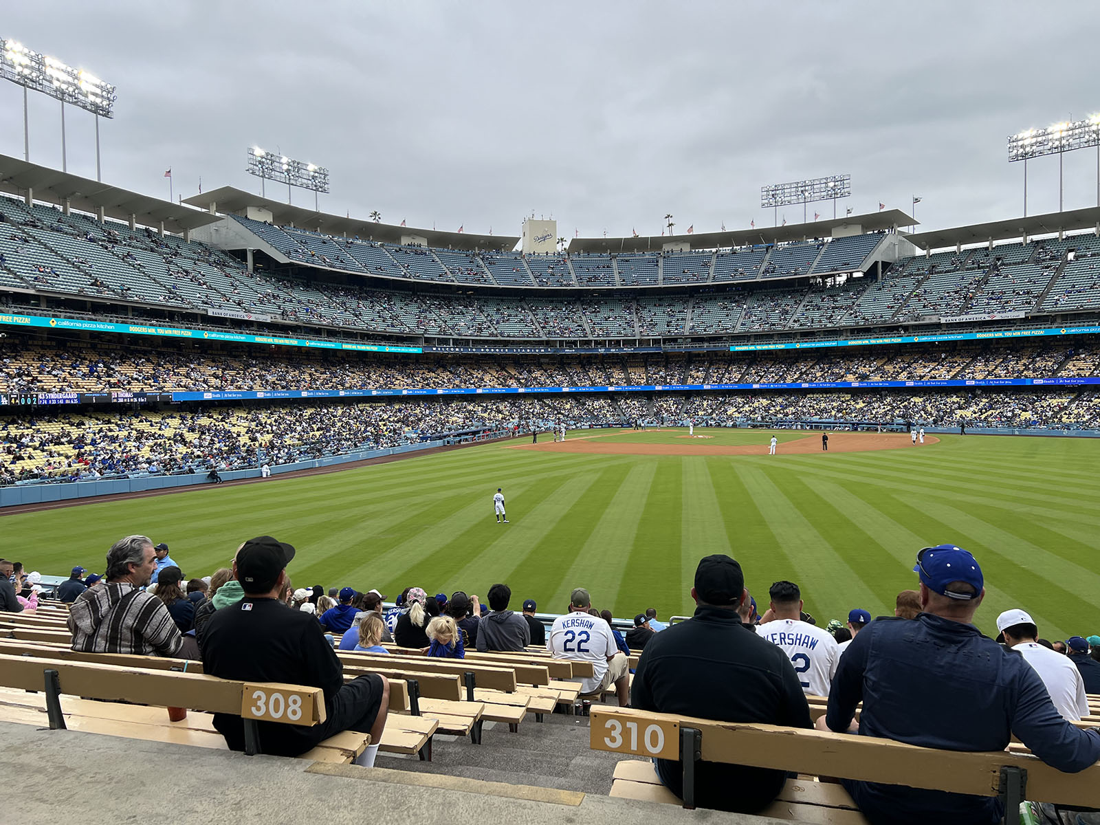 Fans watch a Los Angeles Dodgers game from the right-field bleachers at Dodger Stadium