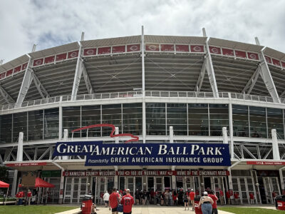 Fans walk up to the home plate entrance at Great American Ball Park in Cincinnati, Ohio