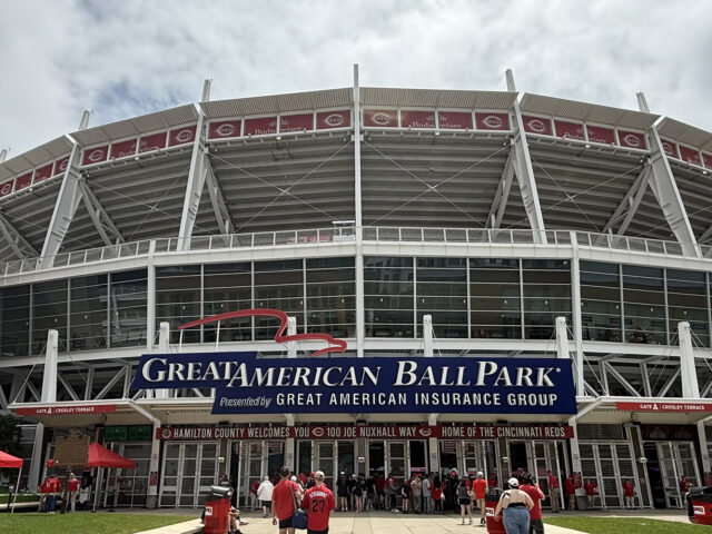 Fans walk up to the home plate entrance at Great American Ball Park in Cincinnati, Ohio