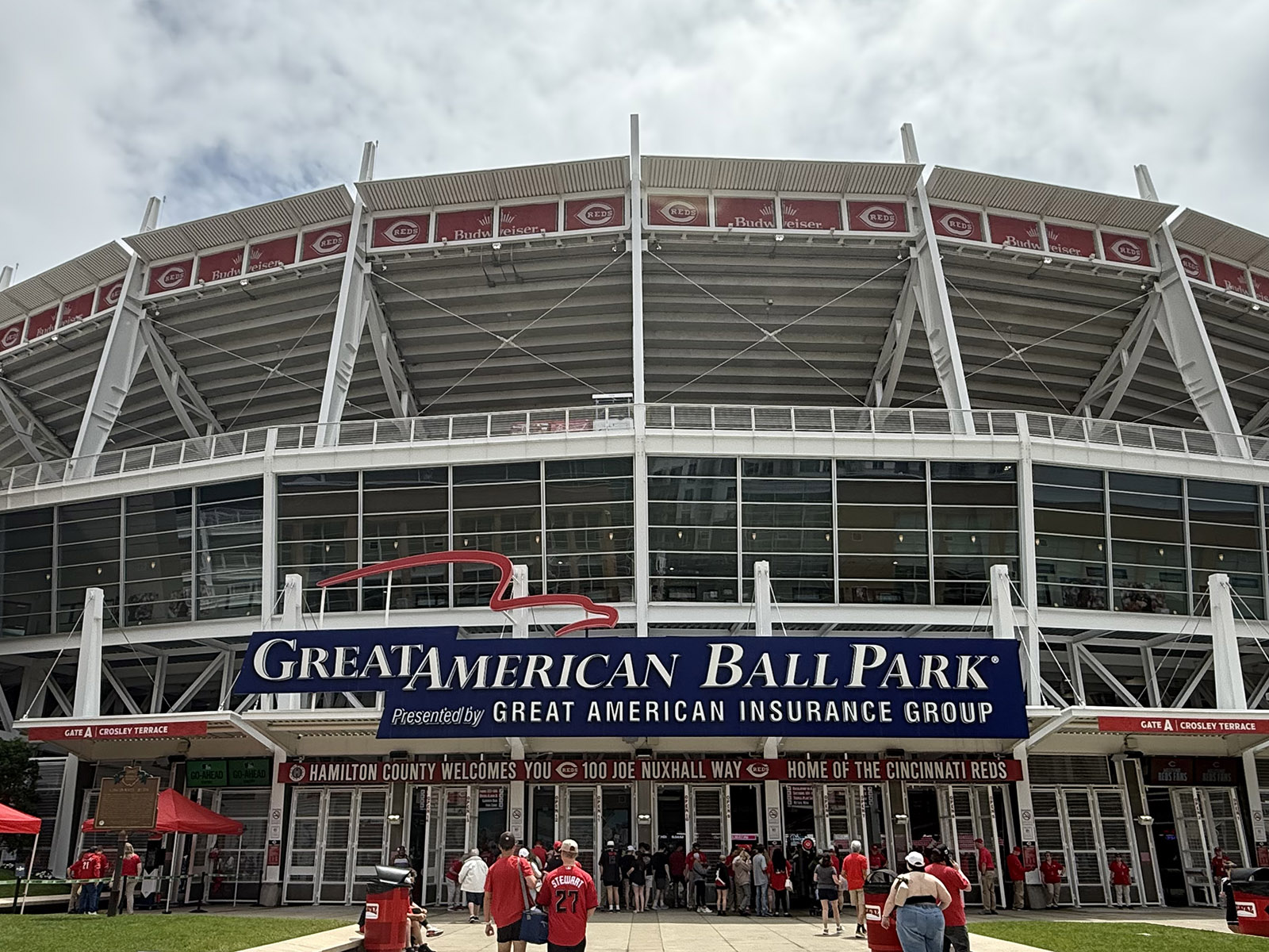 Fans walk up to the home plate gate at Great American Ball Park in Cincinnati, Ohio