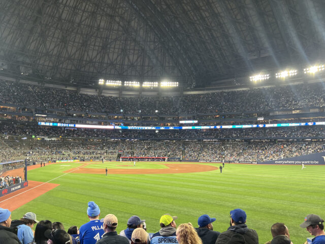 Fans watch a Toronto Blue Jays game from the right-field stands at Rogers Centre