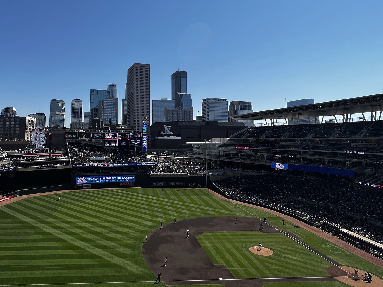 The downtown Minneapolis skyline can be seen beyond the right-field stands at Target Field