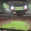 View of the field and seating bowl from behind one of the end zones at Mercedes-Benz Stadium in Atlanta, Georgia