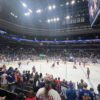 Fans watch pregame warmups from the stands prior to an NHL game at Enterprise Center in St. Louis, Missouri