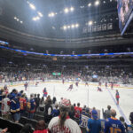 Fans watch pregame warmups from the stands prior to an NHL game at Enterprise Center in St. Louis, Missouri