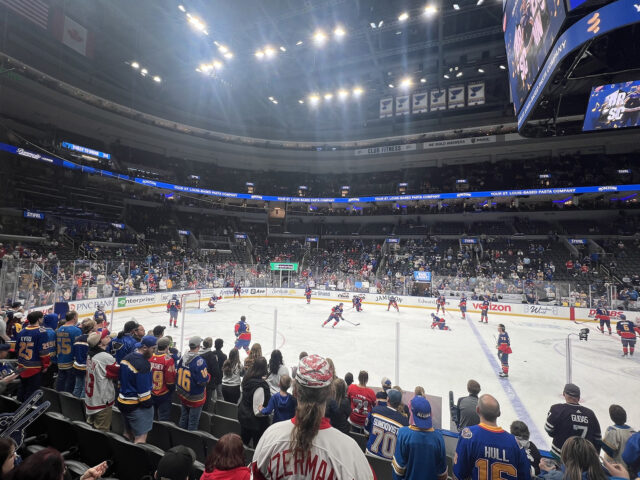 Fans watch pregame warmups from the stands prior to an NHL game at Enterprise Center in St. Louis, Missouri