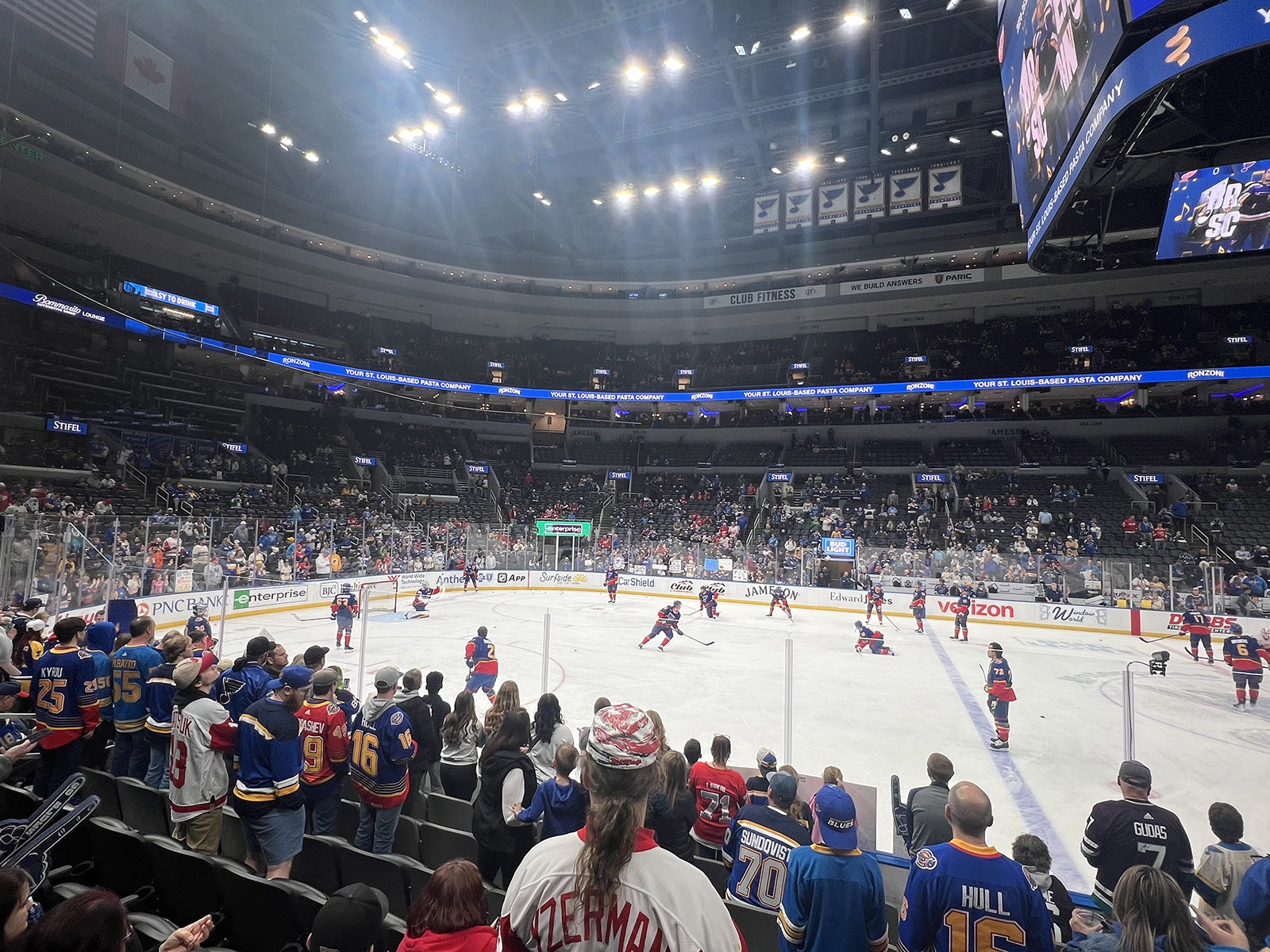Fans watch pregame warmups from the stands prior to an NHL game at Enterprise Center in St. Louis, Missouri