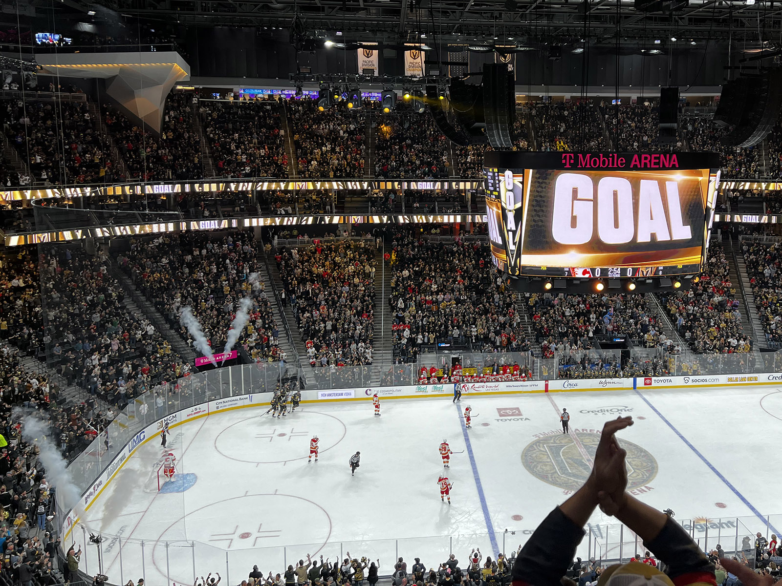 Fans celebrate a Golden Knights goal during a hockey game at T-Mobile Arena in Las Vegas, Nevada